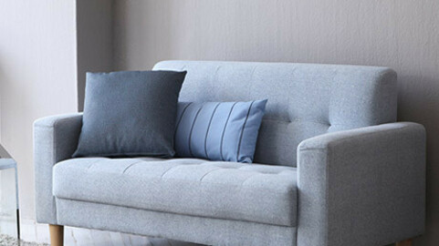 Ruby two-seater fabric sofa