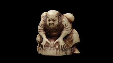 Netsuke of a Shoki capturing a demon with his hat