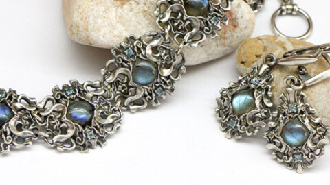 Jewelry set. Sculpted bracelet and earrings with cabochons