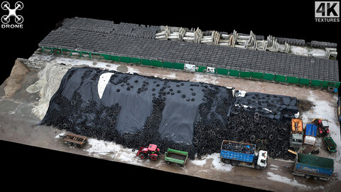 trash pile tires industrial storage terrain drone scan